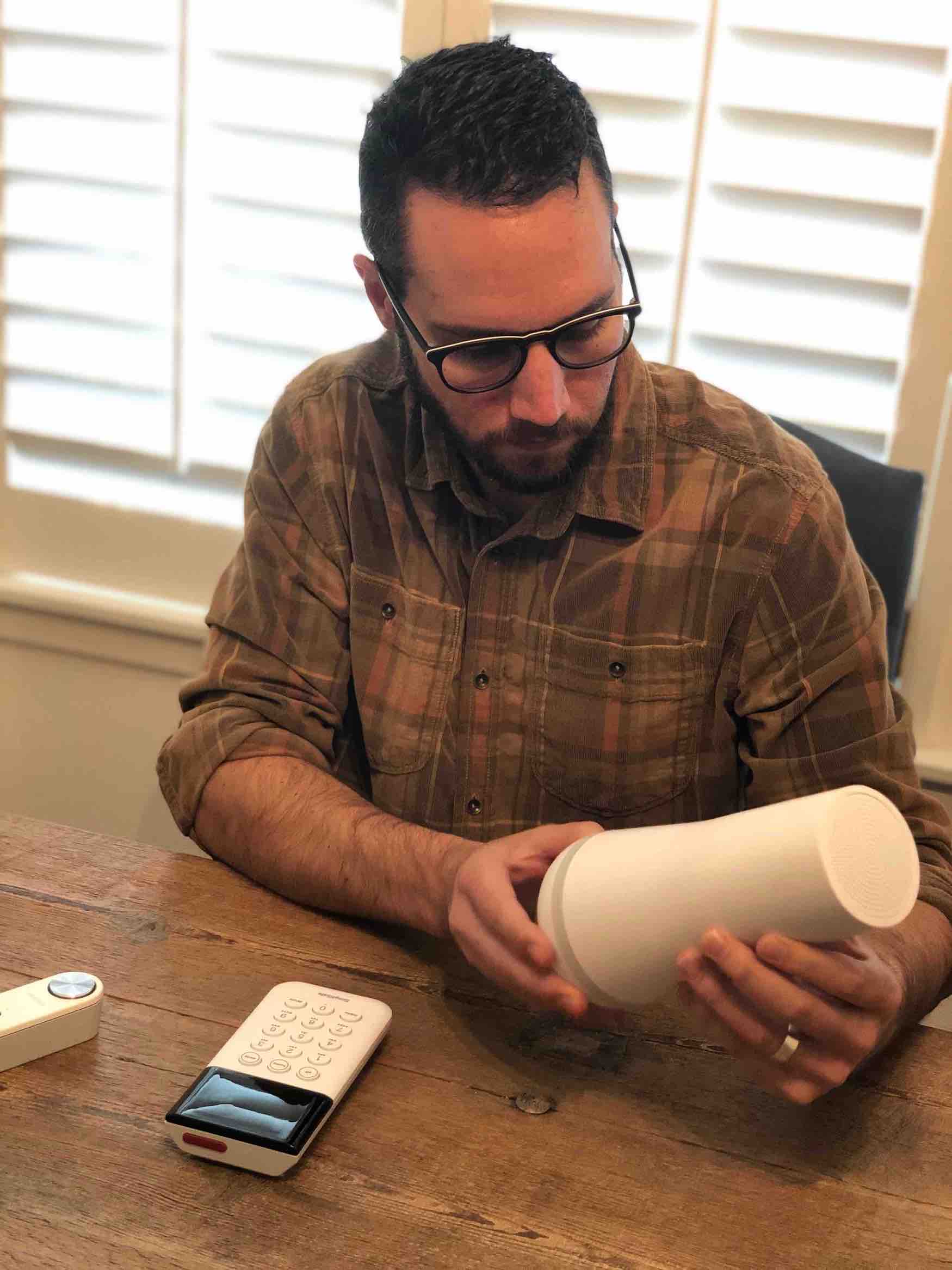 Rob Gabriele Inspecting SimpliSafe Home Security Equipment