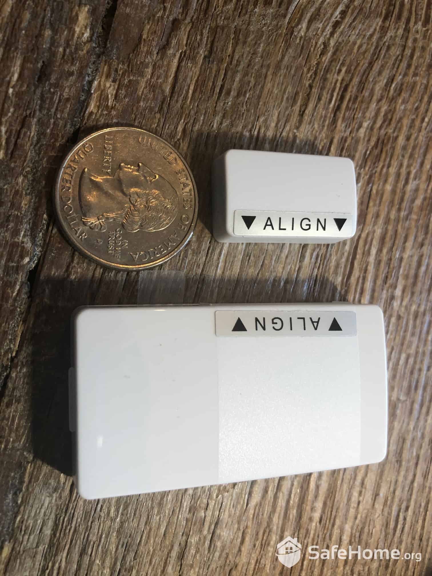 abode Door/Window Sensor Compared to a Quarter