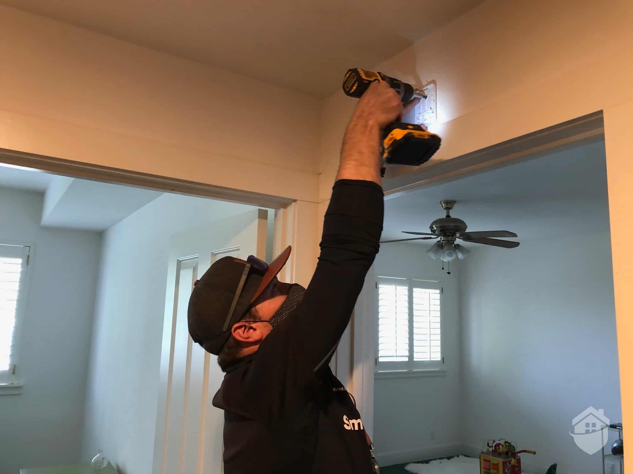 Don our Vivint Installation Technician, Installing the Vivint Glass Break Sensor