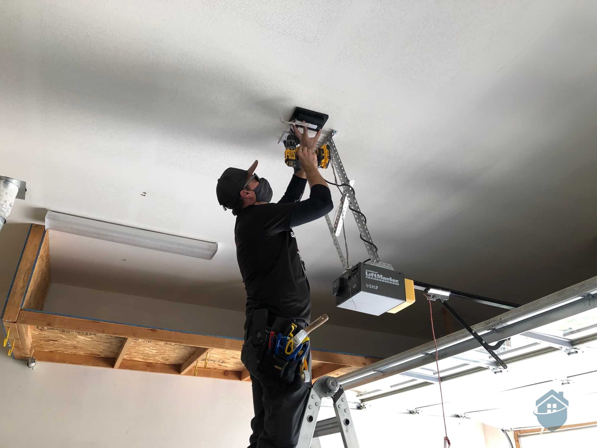 Don, the Vivint Installation Technician, installing our Smart Garage Door Opener