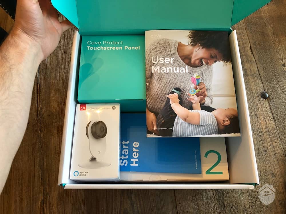Unboxing the Cove security system for testing.