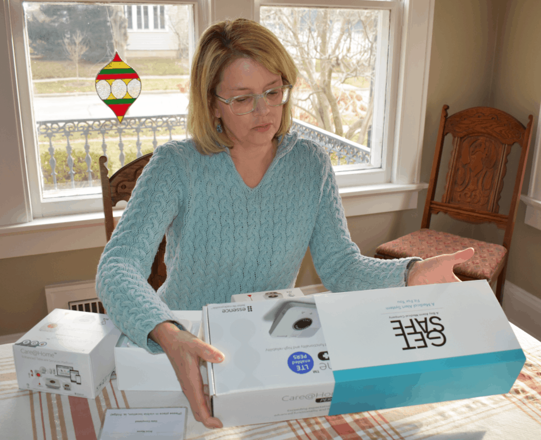 Jenny Wisniewski examining Get Safe equipment