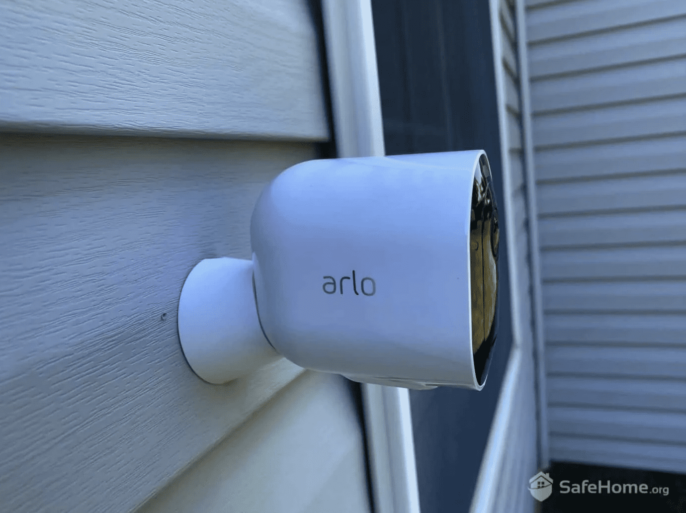 An Arlo Pro 3 security camera mounted outside.