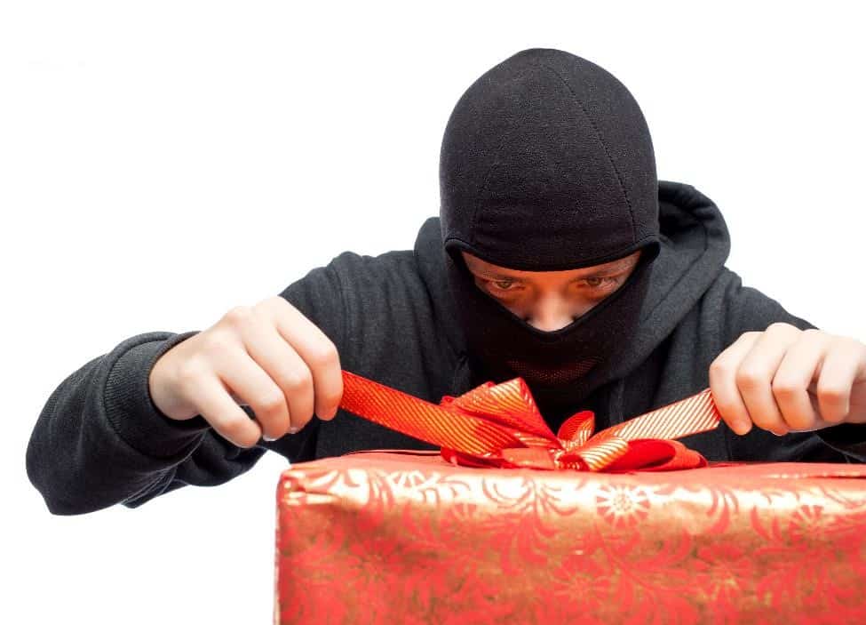 Burglar opening a gift
