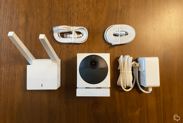 https://www.safehome.org/app/uploads/2023/01/The-Wyze-Outdoor-Cam-v2-box-contents..png