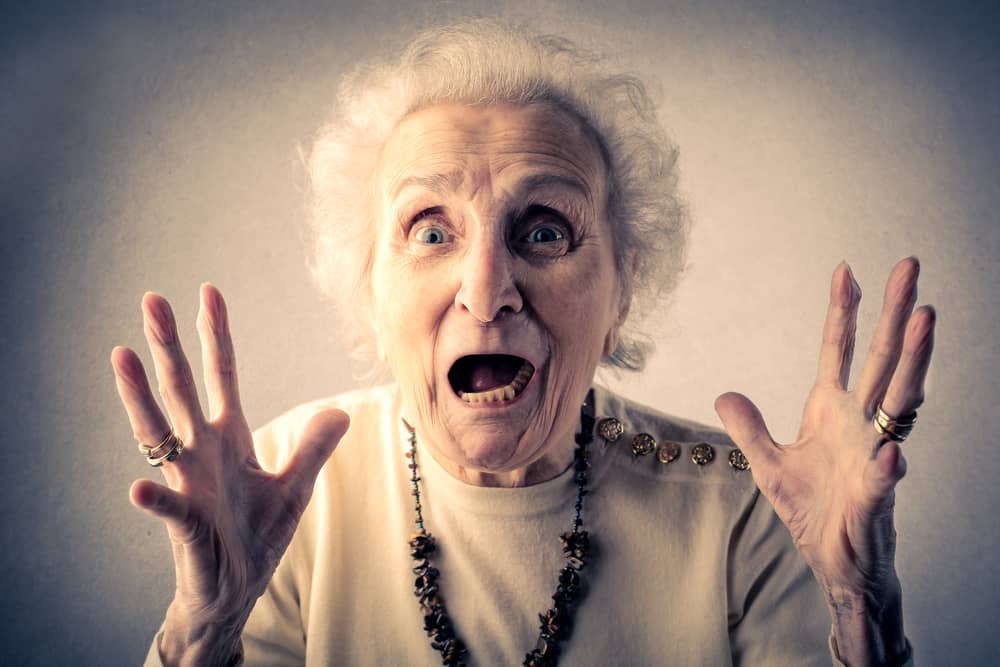 Elderly woman screaming