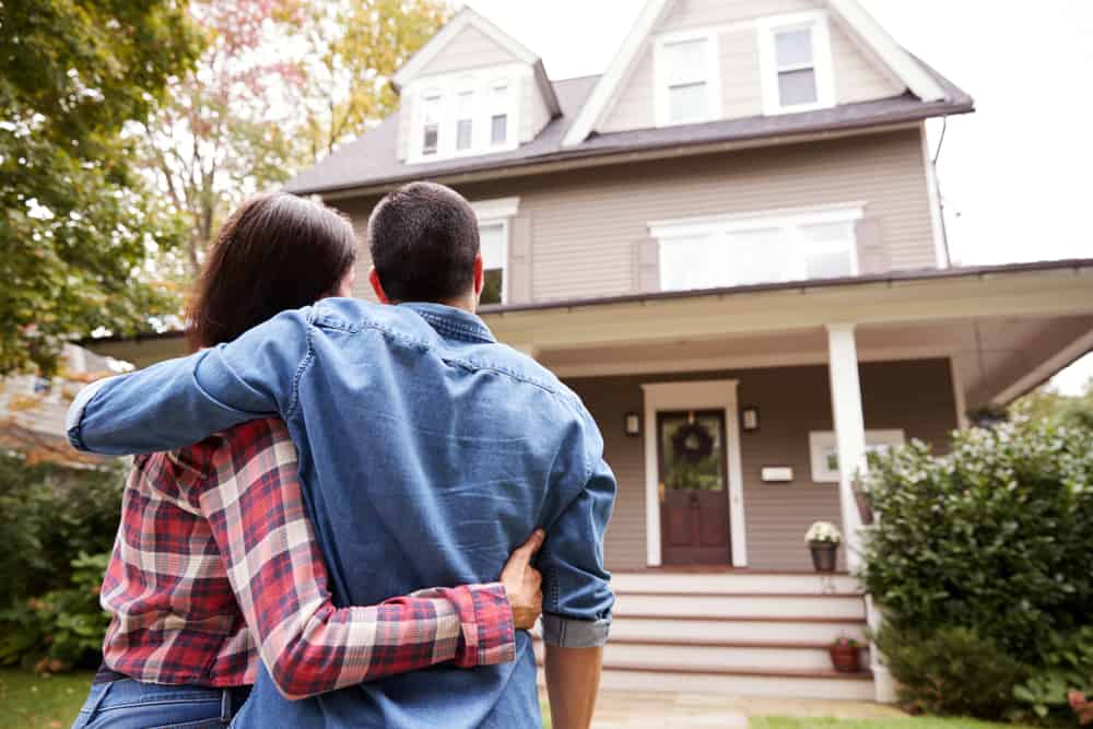 Couple looking at a house