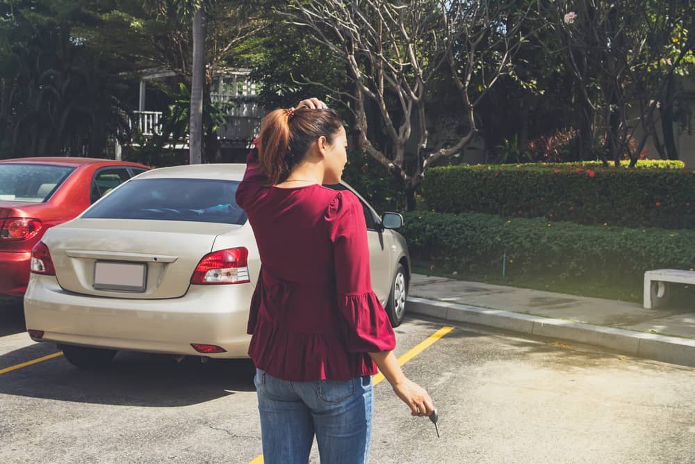 A woman looking for her car