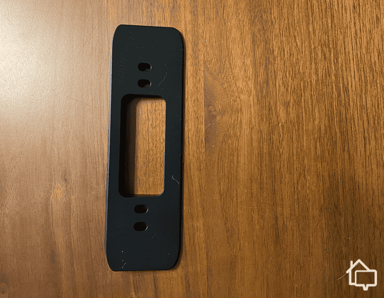 Eufy's plastic mounting bracket.