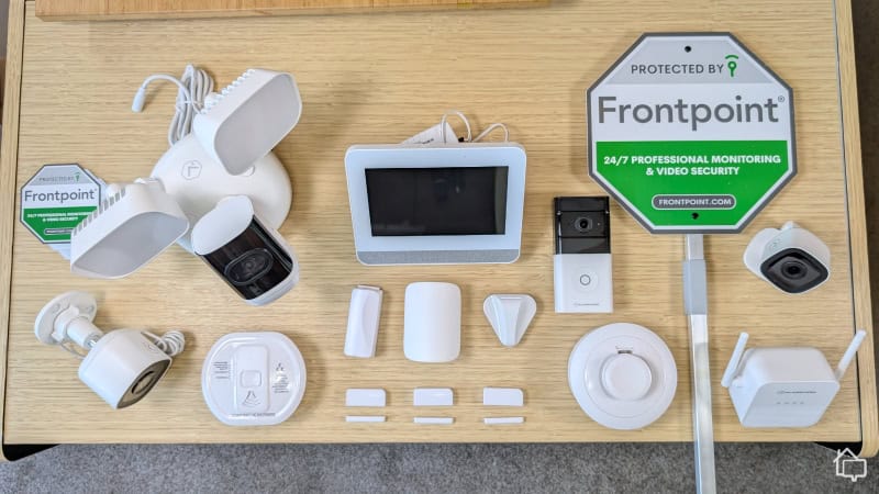 Our $1,200+ Frontpoint equipment laid out on a desk.