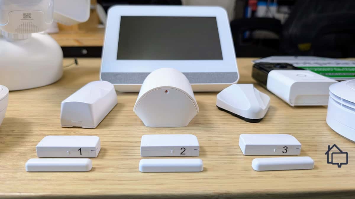 Frontpoint-Control-Panel-Sensors-and-Cameras-on-Bamboo-Desk-2